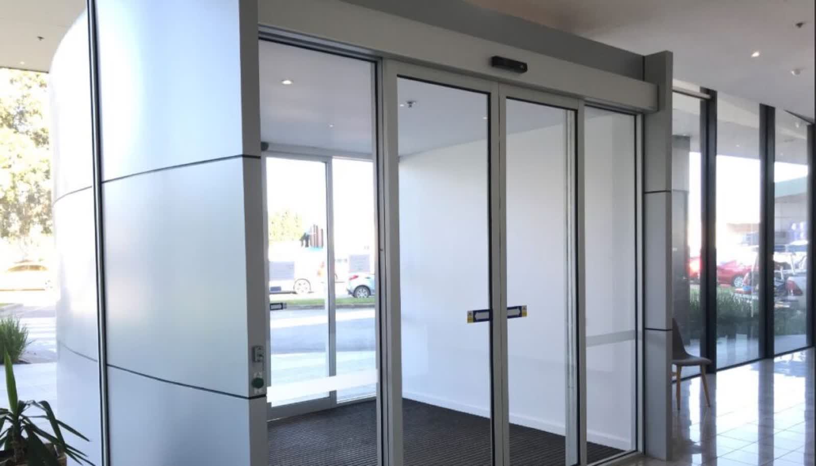 Commercial automatic sliding entrance doors at a storefront