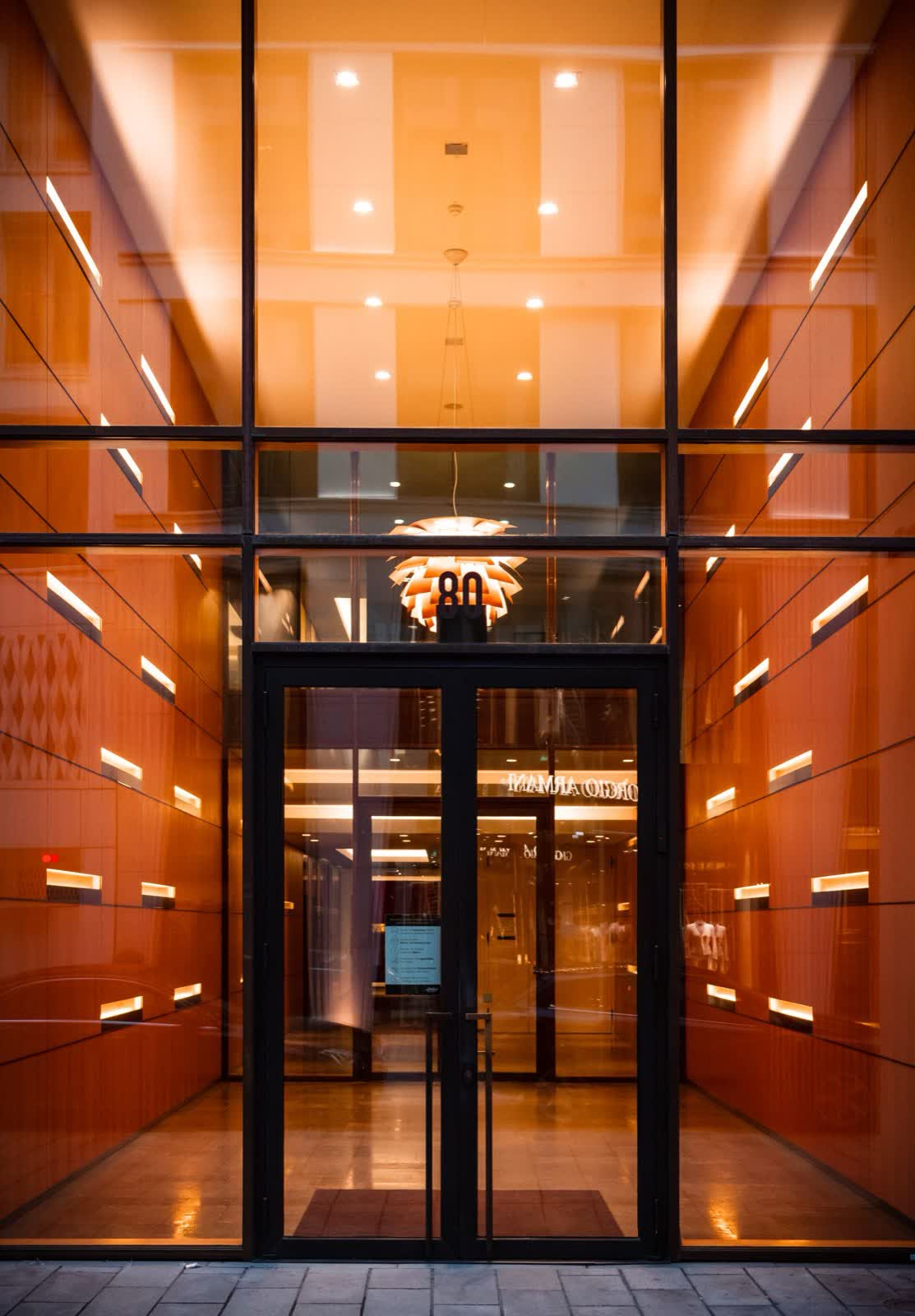 Glass entrance doors of a commercial building lobby